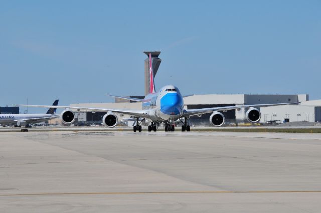 BOEING 747-8 (LX-VCF) - Pulling on to the ramp at North Cargo on 09-04-20. That mask if Fugly.