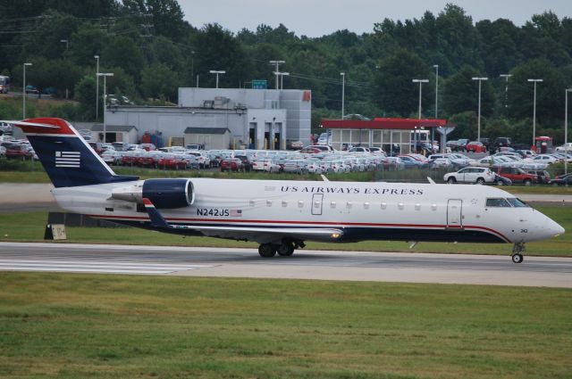 Canadair Regional Jet CRJ-200 (N242JS) - Rolling 18C - 7/12/10