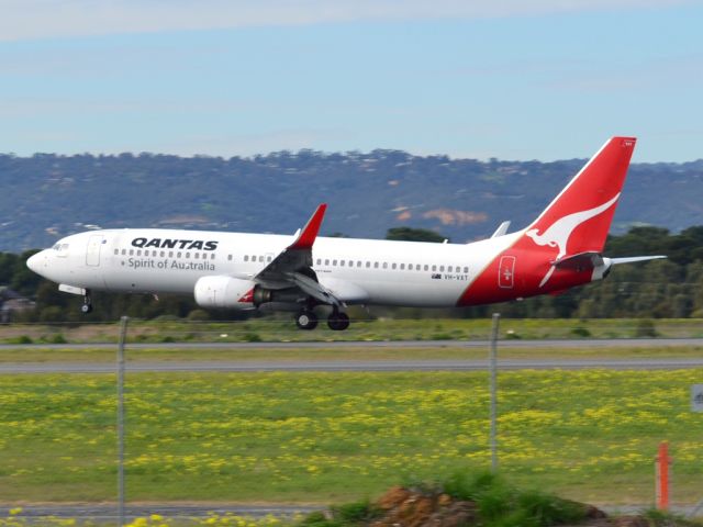 Boeing 737-800 (VH-VXT) - About to put down on runway 05. Thursday 12th July 2012.