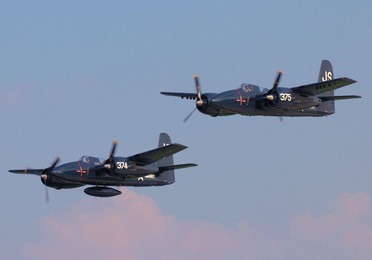 N7629C — - Its a rare enough sight to see one operational Grumman F7F, let alone two flying in formation during EAA AirVenture 2018