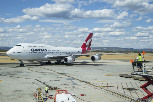 Boeing 747-400 (VH-OEJ) - Wunala Dreaming minus the trademark aboriginal paintwork but still sporting an aboriginal designed kangaroo