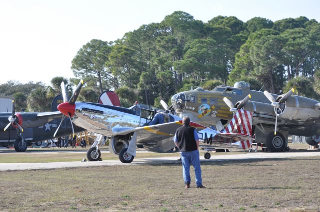 — — - P-51 preparing for flight.  B-17 after flight.  B-24 just before flight...in background.