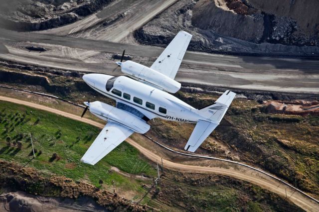 Piper Navajo (VH-NMP) - Chieftain VH-NMP overhead Bengalla Coal near Muswellbrook NSW.