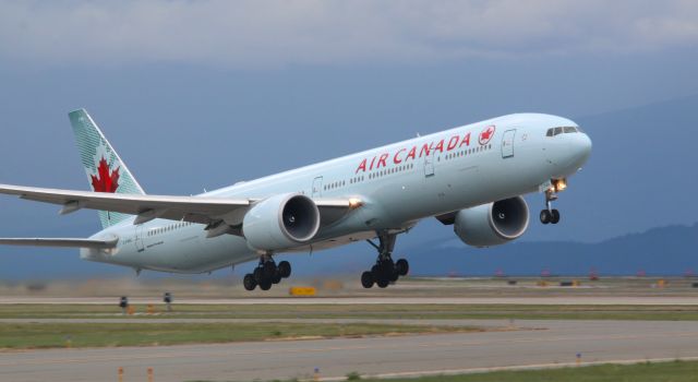 BOEING 777-300ER (C-FNNU) - Evening departure from YVR 08R for LHR with just a bit of vapor visible in the engines