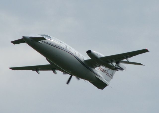 Piaggio P.180 Avanti (N369LC) - Off of runway 23 at the Shreveport Regional airport. A rainy, overcast day!