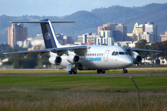 Avro RJ-100 Avroliner (VH-NJH) - On taxiway heading for take-off on runway 05. Wednesday, 21st May 2014.