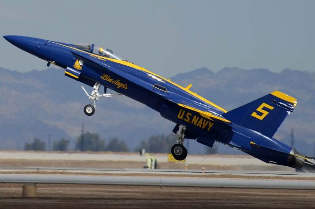 McDonnell Douglas FA-18 Hornet (16-3768) - McDonnell-Douglas F/A-18C Hornet BuNo 163768 Blue Angels #5 pitches up sharply at take-off at NAF el Centro on February 16, 2012.