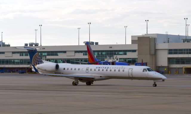 Embraer ERJ-145 (N12142) - United Express Embraer ERJ-145XR N12142 in Denver 