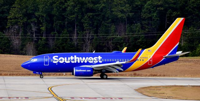 Boeing 737-700 (N7856A) - From the RDU observation deck, 12/23/17.