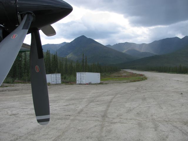 Short 330 (N168LM) - Actually called Squaw Lake gold mine. Other side of the mountain you're looking at is Chandalar Lake, AK