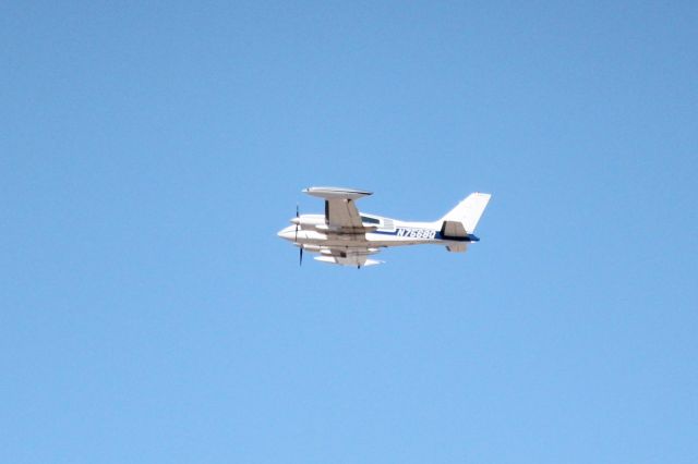 Cessna 310 (N7568Q) - 030914 on takeoff from Hutchison Muni