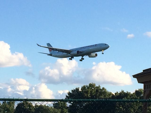 Airbus A330-300 — - Air Canada A333 landing at KPIT rwy 32 BONUS: Czech hockey team on it