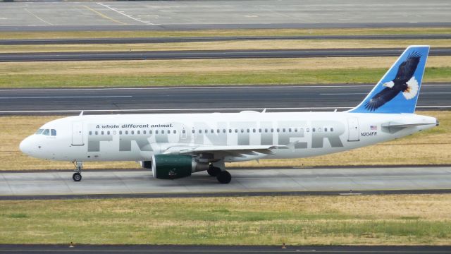 Airbus A320 (N204FR) - An A320 for Frontier Airlines taxiing prior to taking off from PDX on 28L.