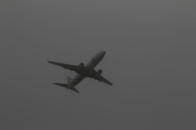 Boeing 737-700 (PH-HSW) - Boeing 737-8K2, Transavia, flying through the clouds in preparation for landing at the Aalsmeerbaan at Schiphol. The origin of the flight is Malaga in Spain.