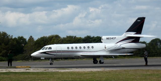 Dassault Falcon 50 (N654CP) - Taxiing to parking is this 1982 Dassault-Brequet Falcon 50 from the Summer of 2023.