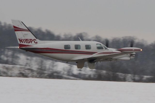 Piper Cheyenne 2 (N115PC) - Taken by friend Craig Stephan. Wheels just above the runway.