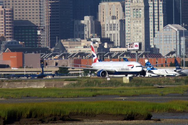 BOEING 777-300ER (G-STBG) - British Airways B777-336(er) parked at BOS on 8/5/20 after diverting from JFK due to weather the previous day. In back is Blue Angels C130 Fat Albert which also had to stop at BOS due to mechanical issues. 