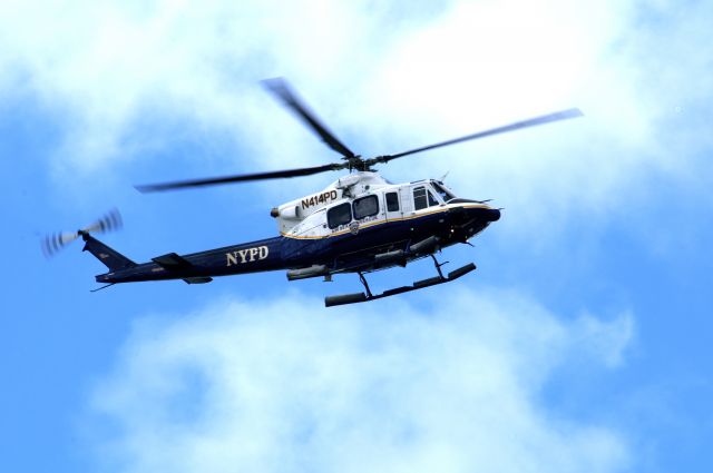 — — - Standing on the banks of the Hudson River.  Prior to the Shuttle Enterprise arrival in NYC on the final mission enroute to its new home on the Intrepid aircraft carrier, the NYPD was checking things out.