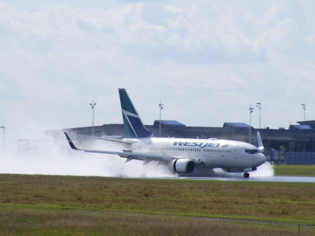 C-GLWS — - landing on a wet runway