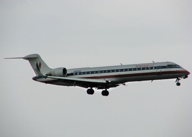 Canadair Regional Jet CRJ-200 (N521AE) - Laning in the pouring rain at DFW.