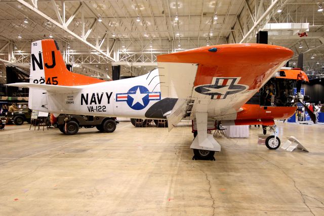 North American Trojan (N65491) - A North American T-28B Trojan, Bu No. 138245, C/N 200-316, on display at the I-X Piston Power Show at the International Exposition Center, adjacent to Cleveland Hopkins International Airport, Cleveland, OH on 15 March 2019. Sadly, this T-28B, owned and operated by Dave Tondi of Sterling, VA, was the only aircraft on display this year. This aircraft was built at the North American Aviation factory in Columbus, OH in 1955 and placed into service with the US Navy on 13 Jun 1955.