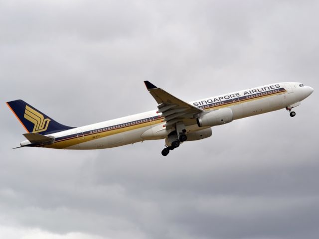 Airbus A330-300 (9V-STP) - Getting airborne off runway 23 and heading home to Singapore. Tuesday 27th December 2011.