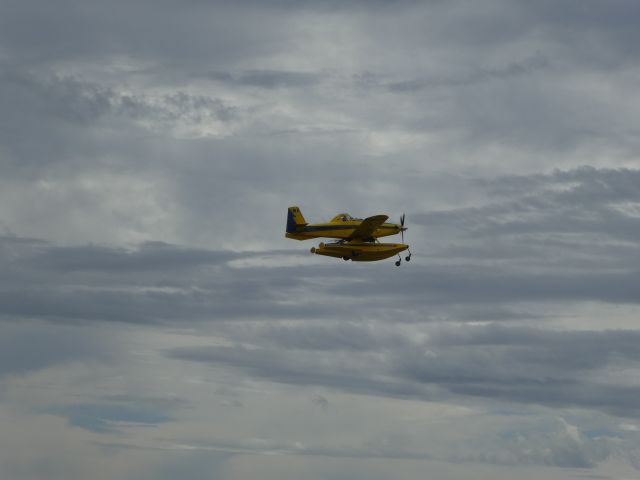 AIR TRACTOR Fire Boss (VH-XAT) - Air Tractor departing Runway 14R for a firebombing duties.