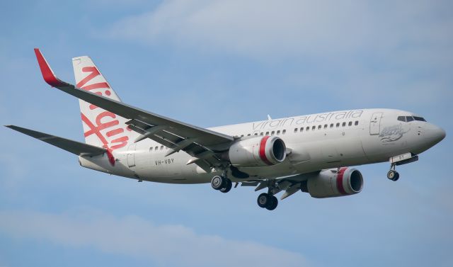 Boeing 737-700 (VH-VBY) - A Virgin Australia Boenig 737-700 landing at Cairns.