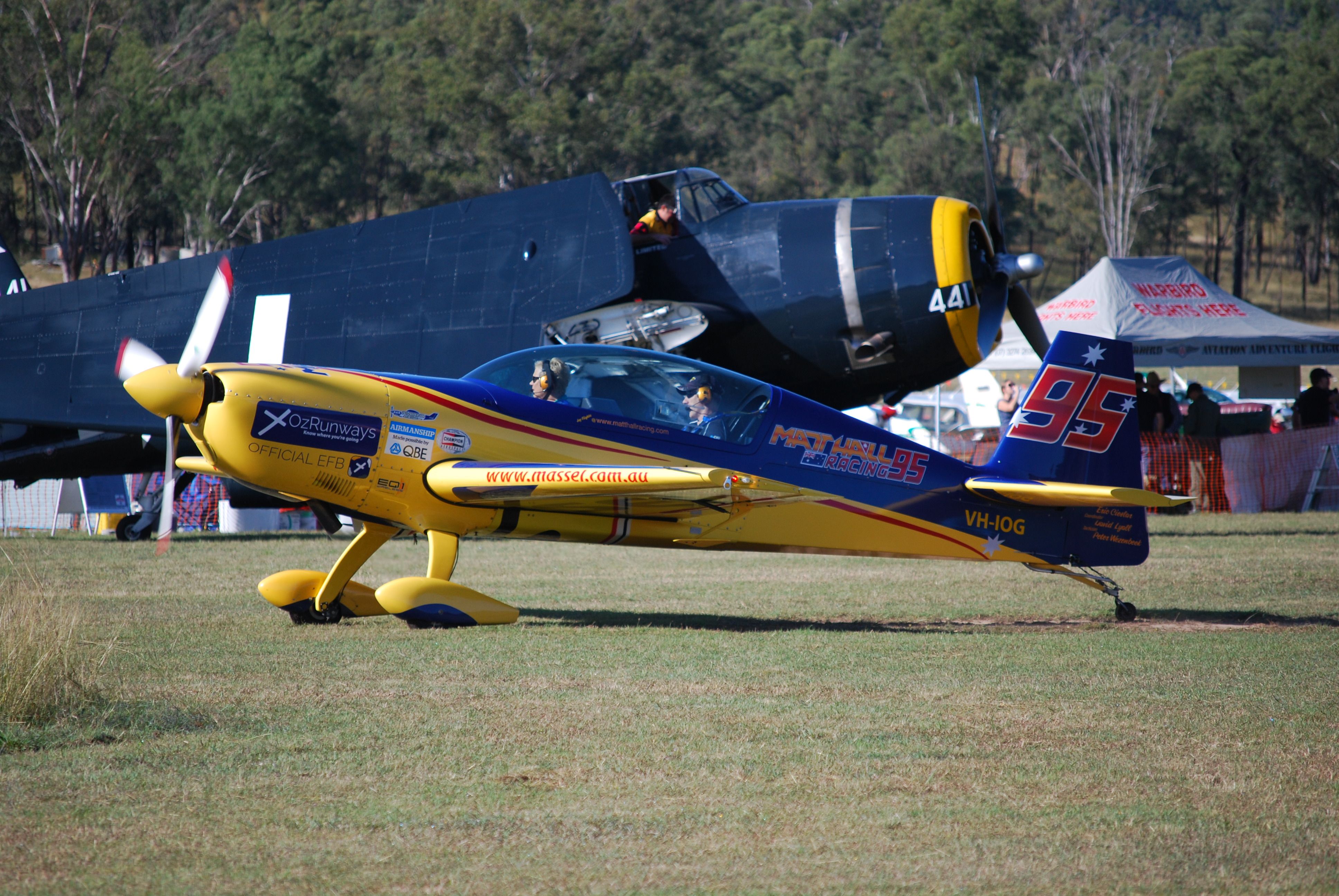 VH-IOG — - EA-300L is dwarfed by TBM Avenger