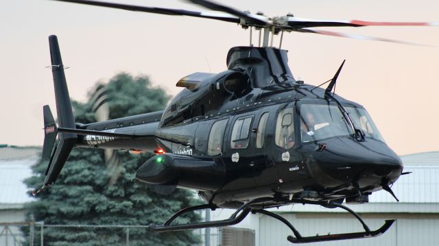 Bell 430 (N556UH) - McMahon’s blacked out 430 departing KVPZ. br /br /N556UH. 2006 Bell 430. McMahon Airborne Logistics. 6/22/23. 