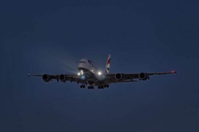 Airbus A380-800 (G-XLED) - ...the sun has set as this British Airways operated Airbus A380 nears touch down at the los Angeles International Airport, LAX, in Westchester, Los Angeles, California