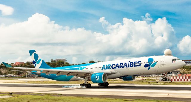 Airbus A330-300 (F-HPUJ) - Air Caraïbes Airbus A330-300 registration F-HPUJ landing at TNCM St Maarten for the very first time sporting some ex Franch Blue colors!! 20/09/2019br /Airport TNCM St Maarten.br /Aircraft type Airbus A330-200.