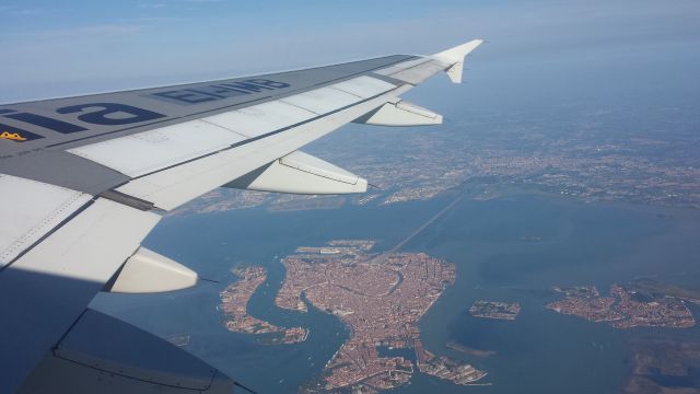 Airbus A320 (EI-IMB) - On Alitalia A-320, over the beautiful Venice (IT). It's possible to see San Marco square and the lagoon