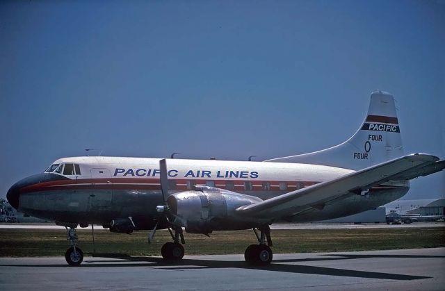 MARTIN 404 (N636X) - Pacific Air Lines Martin 404 N636X at Van Nuys on June 23, 2000. It was delivered to TWA on July 16, 1952, registered as N40429. Its name was Skyliner Peoria. In 1959 it was sold to California Airmotive Corporation. Subsequently it was owned by E. F. McDonald, James McAlister, Montex Drilling Corporation, Airworld Incorporated, Whitesell Construction Corporation, Joe Simpkins Oil, Tiffany Industries Isd., Phase II Incorporated, and Sun & Wind Incorporated. It is currently registered to the Planes of Fame Air Museum. The bulge on the top rear of the engine nacelle is a housing for a JATO unit.