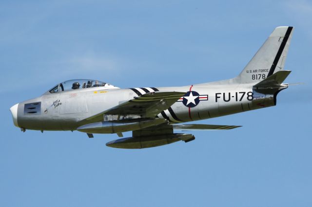 — — - North American F-86A Sabre, performs fly past at Old Warden Aerodrome.