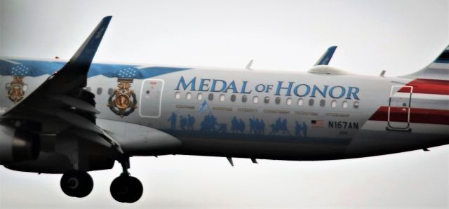 Airbus A321 (N167AN) - Horrible weather here today, so the photos are whatever. But as the son of a Bronze Star  Vet...nothing but RESPECT!!