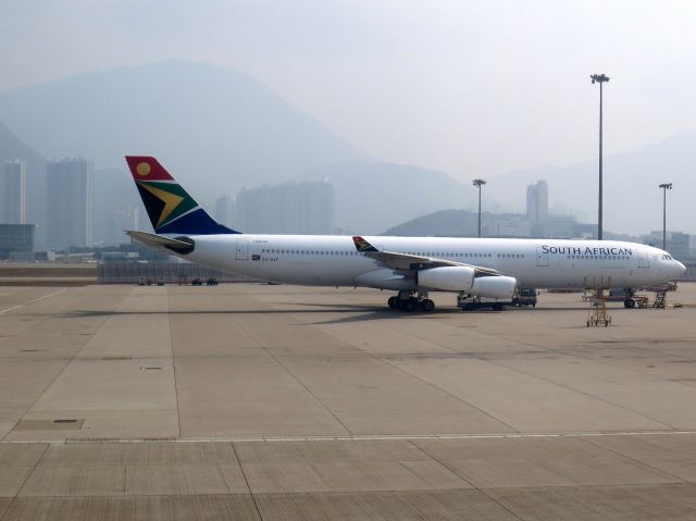 Airbus A340-300 (ZS-SXF) - February 23, 2013, on pushback, from seat 30K on Cathay Pacific Airways flight 870, at Chek Lap Kok Hong Kong International Airport.