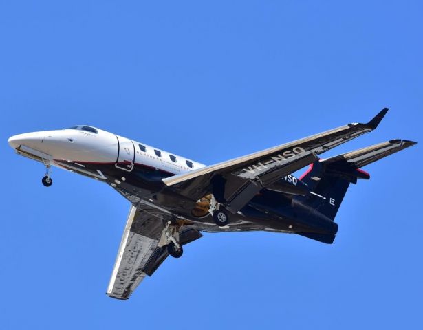 Embraer Phenom 300 (VH-NSQ)