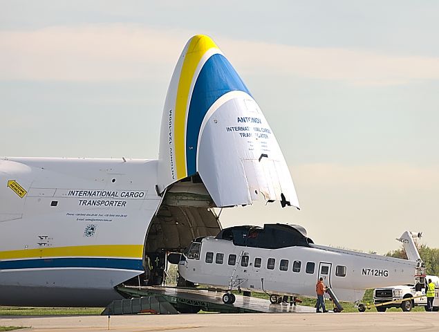 N712HG — - Construction Helicopters Inc. S-61N getting unloaded from the Antonov AN124 after completing a tour in Afghanistan.