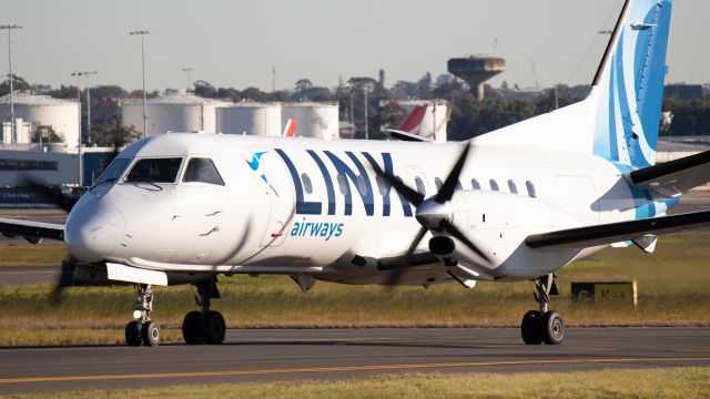 Saab 340 (VH-VEF) - Link airways SAAB340B taxiing past Shep's mound. 