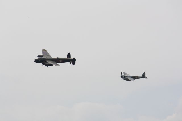 — — - Lancaster and mosquito together at CYHM