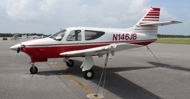 Rockwell Commander 114 (N146BP) - A 1975 model Rockwell Commander 112A (according to the FAA Registry) tied down on the Gulf Air Center ramp at Jack Edwards National Airport, Gulf Shores, AL - June 19, 2018.