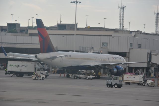 Boeing 757-200 (N6715C) - Delta Airlines 757-200, N6715C or flight DAL6204, being serviced prior to departure from Gate D6 at KFLL...