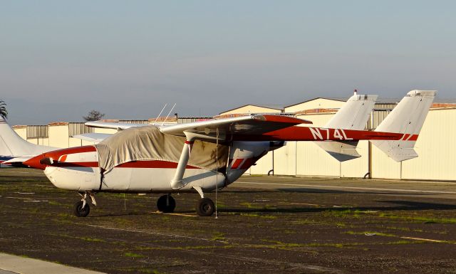 Cessna Super Skymaster (N74L) - Local Cessna 337 parked at a temporary tie down to make room for Super Bowl 50 aircraft. It is for sale and this is one of the last pictures I ever got of it. It's now in Arizona.