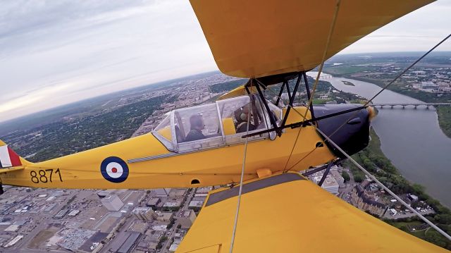 OGMA Tiger Moth — - Saskatchewan Aviation Museum WWII Tiger Moth flying over the South Saskatchewan River in downtown Saskatoon