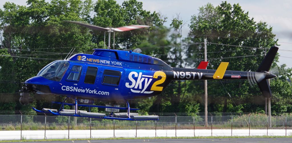 Bell JetRanger (N95TV) - LINDEN AIRPORT-LINDEN, NEW JERSEY, USA-JULY 13, 2022: A news helicopter from one of the local New York City television stations is seen by RF at approximately 1633 hrs.