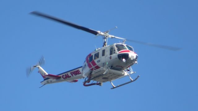 Bell UH-1V Iroquois (N4950F) - Sorry for the graininess this was taken on my old camera, but I really like the angle.