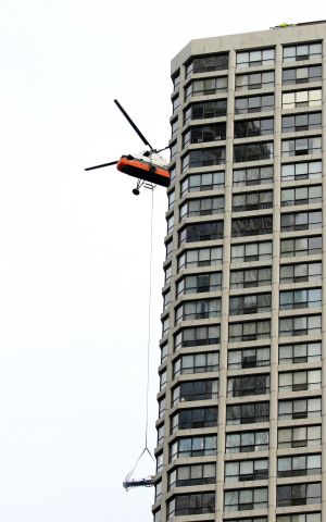 Aerospatiale Dauphin 2 (SA-365C) (N4247V) - Delivering A/C chillers to high rise rooftop, downtown Chicago