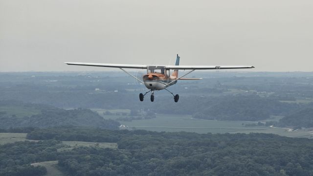 Cessna Commuter (N61234) - Flying around the Mississippi river for the Cessna 150 Fly-In near Clinton, Iowa.