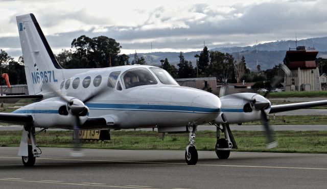 Cessna 421 (N6867L) - Locally-based Cessna 421 taxing in with the RHV TWR in the background.